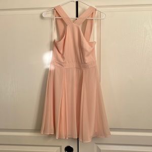 Lulus dress size small. Very cute and flattering